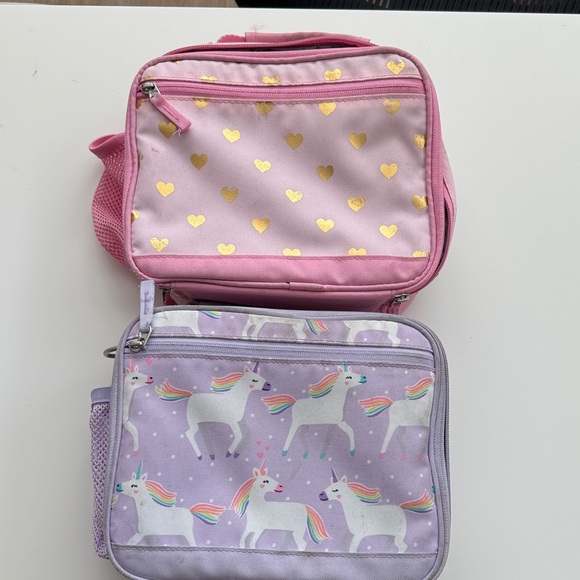 2 Pottery Barn Kids lunch boxes 
Pink hearts and purple unicorn 
Needs wipe down - Picture 1 of 7